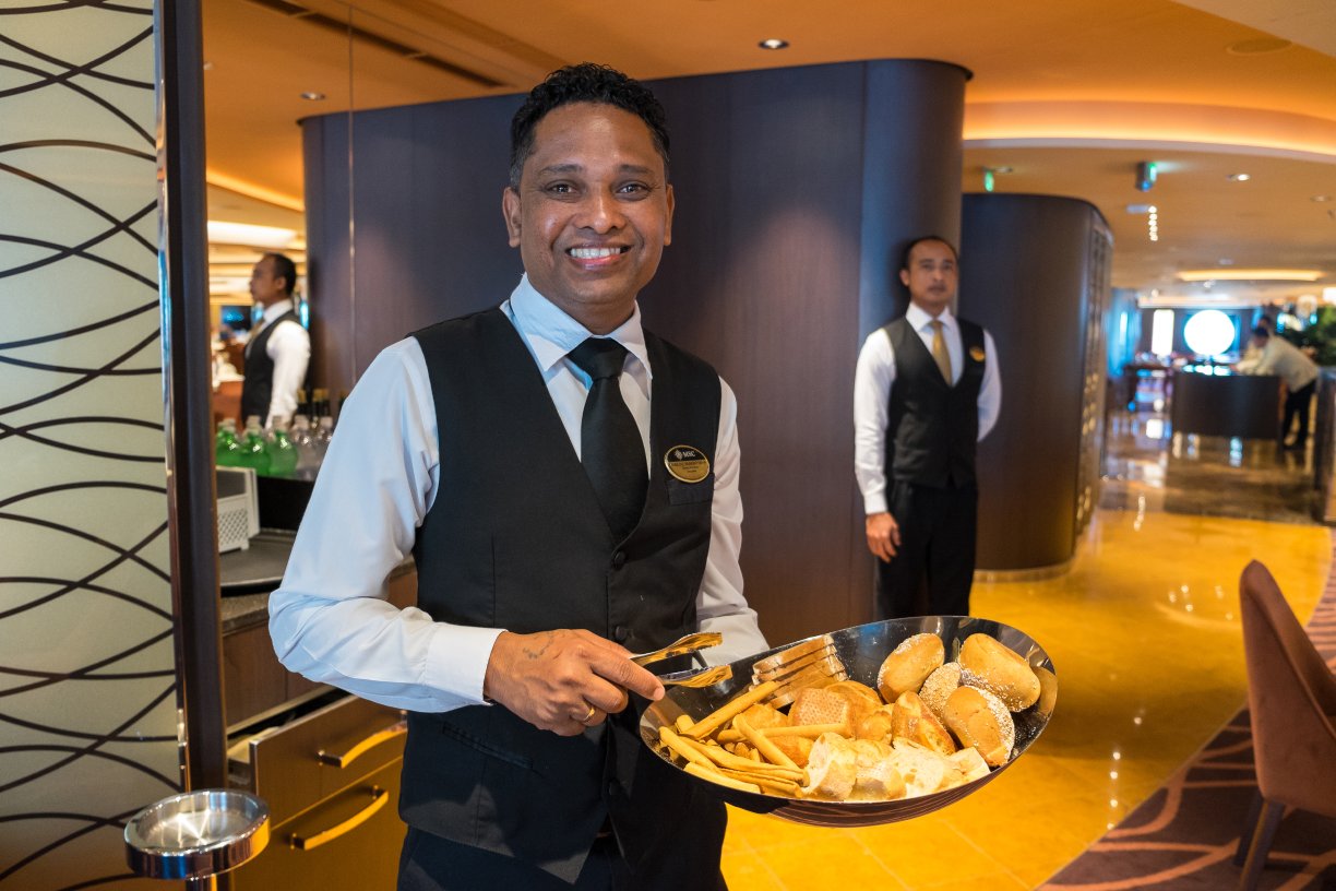 Crew member serving food