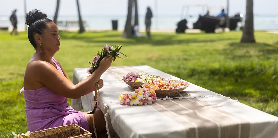 Woman making Hawaiian Lei 